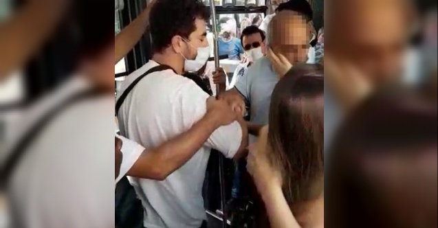 Metrobüste kendisinin fotoğrafını çeken şahsa tokat attı