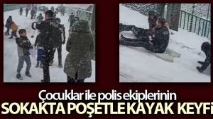 Çocuklar ile polis ekiplerinin sokakta poşetle kayak keyfi